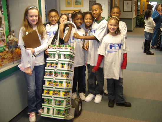 Holiday Food Drive Milken Festival for Youth participants from Greenbriar Elementary School collect items for the Holiday Food Drive.