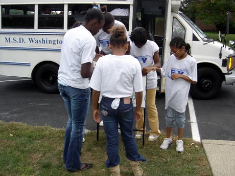 MFFY Monthly Activity Milken Festival for Youth participants from Greenbriar Elementary School spend the afternoon posting positive behavior signs at the bus stops in their community.