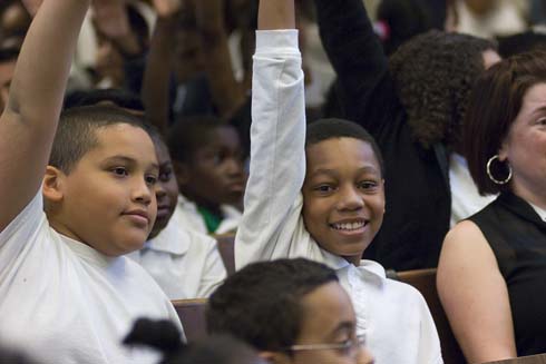 Daniel R. Cameron Elementary School Cameron Elementary students raise their hands, vying for the chance to help Foundation Chairman Lowell Milken make a surprise announcement about one of their educators.