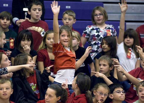 Discovery Canyon Campus Discovery Campus Canyon students raise their hands hoping to be called on to help make a special announcement about one of their outstanding teachers.