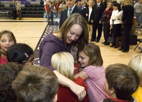 Discovery Canyon Campus Trisha Brennan is swarmed by her students clamoring to congratulate her on her $25,000 Milken Educator Award.