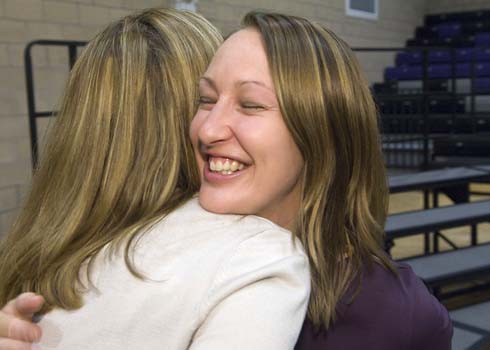Discovery Canyon Campus New Milken Educator Trisha Brennan gets a congratulatory hug from a colleague.
