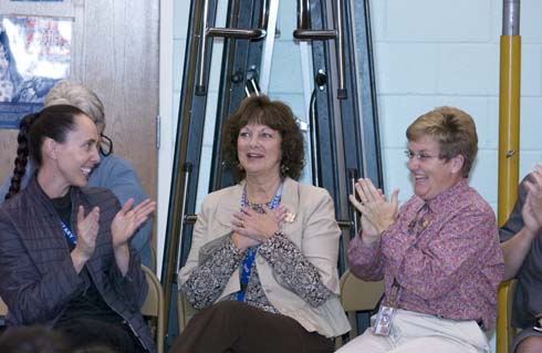 Empire Elementary School First-grade teacher Gayle Magee (center) reacts with shock on hearing her name announced as the recipient of a $25,000 Milken Educator Award.