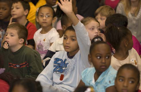 Fontenelle Elementary School A Fontenelle Elementary student raises his hand, volunteering to help Milken Educator Awards Senior Vice President Dr. Jane Foley make a special announcement.