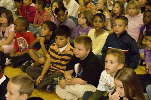 Garden City Elementary School Students at Garden City Elementary School listen attentively to the special guests at their schoolwide assembly.