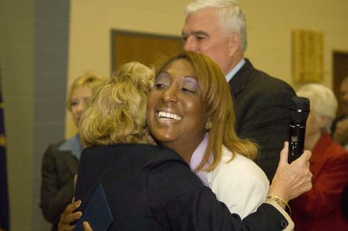 Garden City Elementary School Nicole Law gets a congratulatory hug from Indiana State Superintendent of Public Instruction Suellen Reed after being surprised with a $25,000 Milken Educator Award.