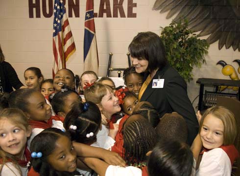 Horn Lake Elementary School Horn Lake Elementary students swarm around their beloved assistant principal Rosie King to congratulate her on her $25,000 Milken Educator Award.
