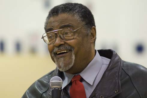 Nellie Stone Johnson Community School Football giant Rosey Grier tells the young students of Nellie Stone Johnson Community School, 'Your minds are much bigger than my size.'