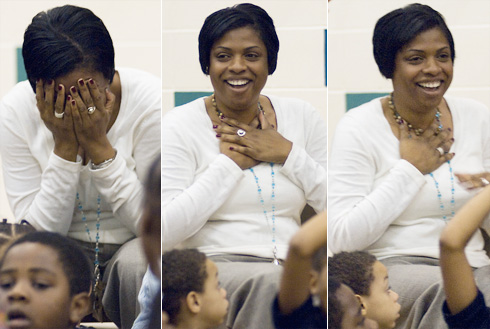 Nellie Stone Johnson Community School Math instructional coach Kelly Woods reacts to the surprise announcement that she will receive a $25,000 Milken Educator Awards.
