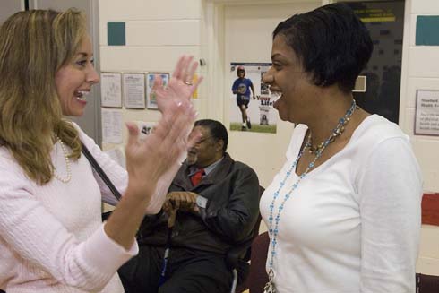 Nellie Stone Johnson Community School Minnesota First Lady Mary Pawlenty chats with new Milken Educator Kelly Woods.