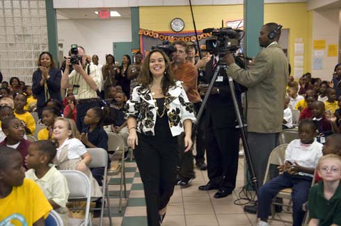 Thelma Smiley Morris Elementary School Math coach Stephanie Glover steps forward to accept her $25,000 Milken Educator Award amid the thundering cheers of students and colleagues.