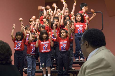 North Alamo Elementary School North Alamo Elementary students kick off a schoolwide assembly with a musical performance. In the foreground is football legend Rosey Grier, one of several special dignitaries attending the assembly.