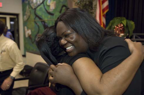 Rock Chapel Elementary School Andrea King gets a congratulatory hug after being surprised with a $25,000 Milken Educator Award.