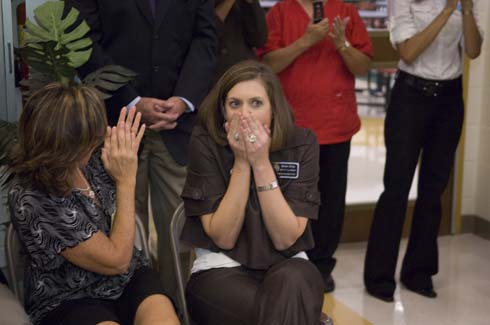 Sawyer Road Elementary School Susan Grigg reacts with shock as she hears her name announced as the recipient of a $25,000 Milken Educator Award.