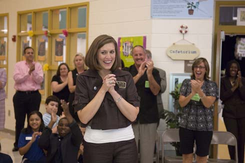 Sawyer Road Elementary School Susan Grigg steps forward to accept her $25,000 Milken Educator Award.