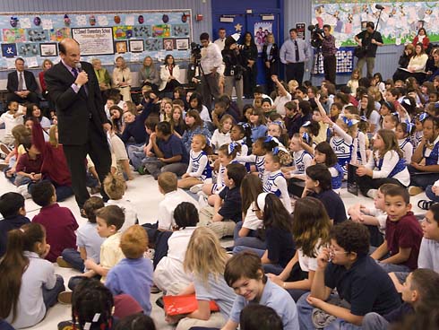 C.T. Sewell Elementary School Milken Family Foundation Co-Founder Michael Milken seeks volunteers among the Sewell Elementary student body to help him make an important announcement.