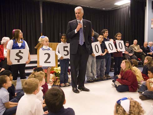 C.T. Sewell Elementary School As Sewell Elementary students hold up cards displaying the amount of the Milken Educator Award, U.S. Senator John Ensign of Nevada prepares to announce the name of the unsuspecting recipient.