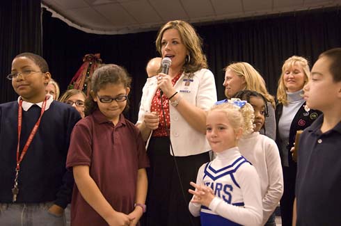 C.T. Sewell Elementary School Surrounded by several of her students, Principal Carrie Larson thanks her staff and students for all their hard work.