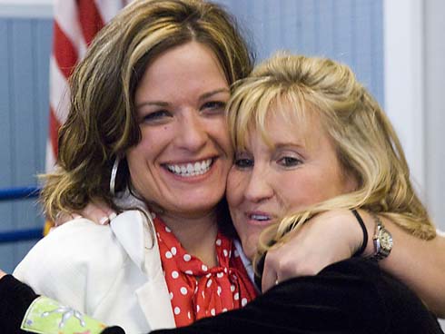 C.T. Sewell Elementary School Principal Carrie Larson hugs a colleague after being surprised with a $25,000 Milken Educator Award.