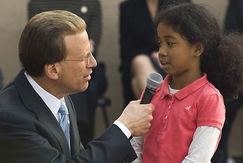 Solano Avenue Elementary School Milken Family Foundation Chairman Lowell Milken asks a young Solano student what 'excellence' means.