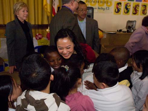 Visitacion Valley Elementary School Mindy Yip celebrates her surprise $25,000 Milken Educator Award with her jubilant students.